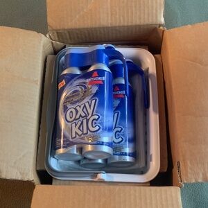 NIB Bissell OXYKIC cleaning kit. Basket, 2 stain removers, 5 packages cloths.